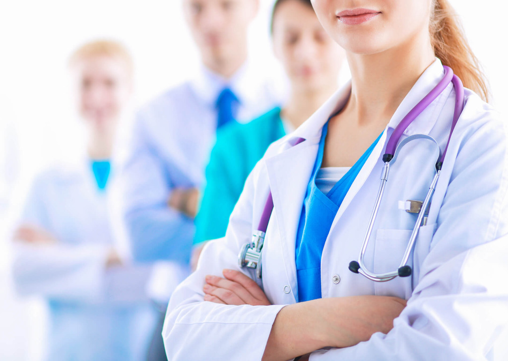 A team of doctors standing in a row