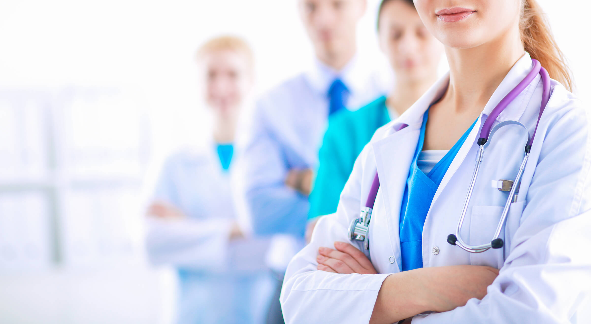 A team of doctors standing in a row